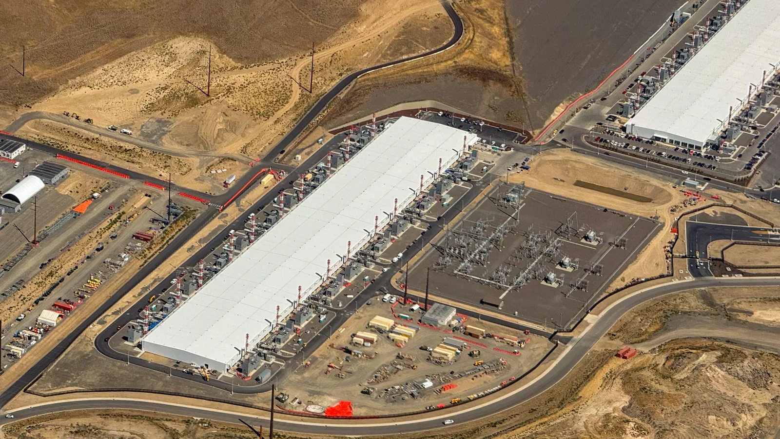 Aerial view of a large Microsoft Azure data center hall and its substation in Wenatchee, Washington.